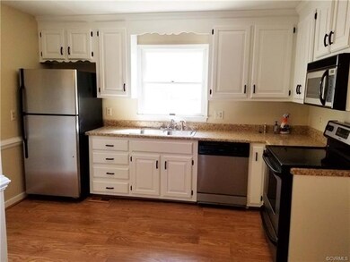 Kitchen work area with appliances and freshly pain