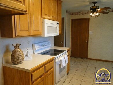 The kitchen has an eat in area for casual dining