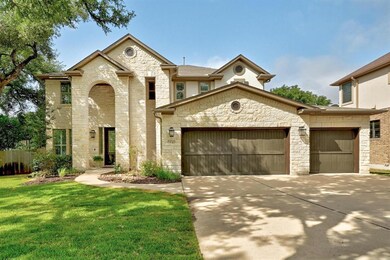 View of front facade featuring stone siding, an a