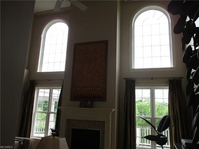 Upper living room windows have remote control blin