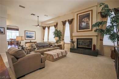 Enter into the family room with gas fireplace and