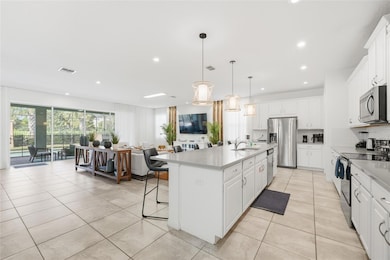 8967 Amelia Downs Trail, Four Corners, FL 34747 - photo 2