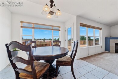 Breakfast nook off the kitchen walks out to the bi