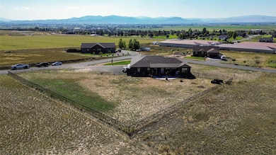 Overview of rural landscape with a mountain backdrop