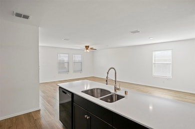 Kitchen with dishwasher, open floor plan, visible 