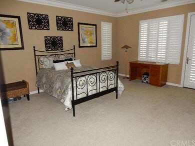 Large master with door to rear yard. Crown molding