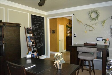Second living/study/office with chalkboard wall