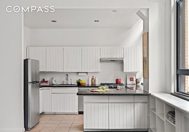 348 W 38th St unit 9-E, New York, NY 10018 - photo 4