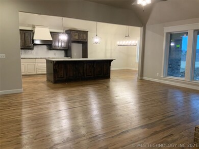 Beautiful kitchen features a vaulted/ beamed ceili