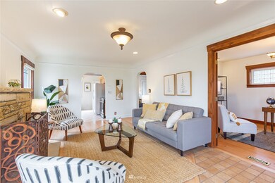 Open & light filled living room with real hardwood trim.