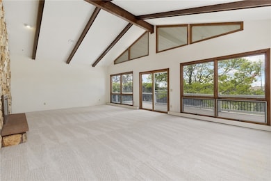 Massive living room w/big windows and lots of natu