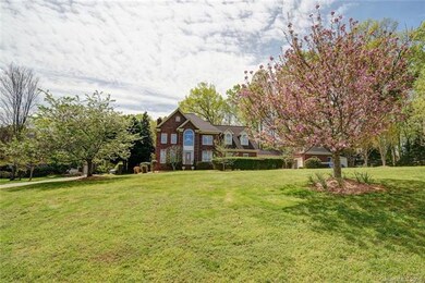 Mature landscaping, beautiful seasonal trees and l