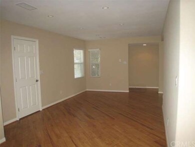 This former kitchen looking towards the entry