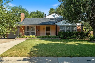 Single story home with a front yard