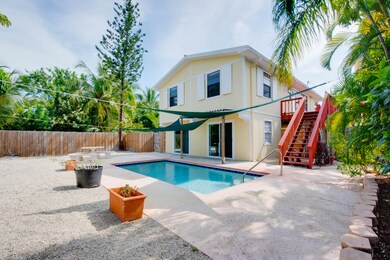 Back of house and stairs from pool area