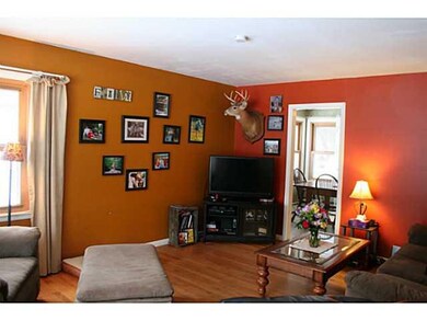 Living Room. Hardwood flooring through out this ho