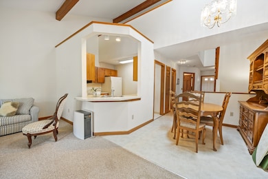 LR open concept showing kitchen and dining area
