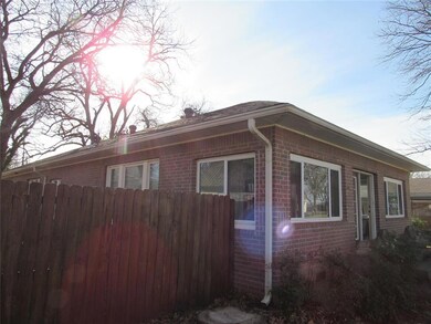 View of home's exterior featuring brick siding and