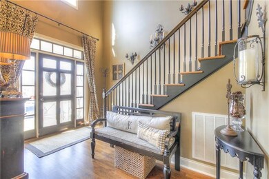 Dramatic 2 story entry foyer. 