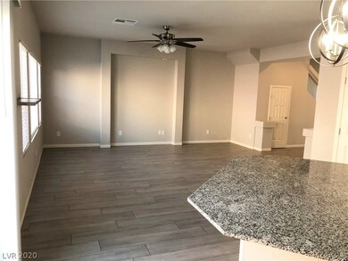The family room. Grey tiled floors and neural pain