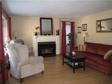 Living Room. Wood floors and gas fp really warm up