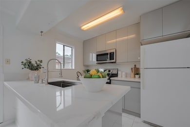 Upgraded kitchen with new cabinets, counters, and