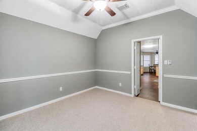 Located just off the entry is the spacious formal