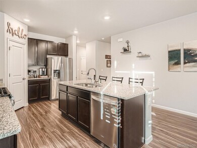 Notice the luxury plank flooring