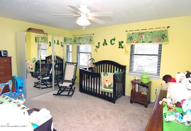 2nd bedroom w/ 2 closets & attached bath