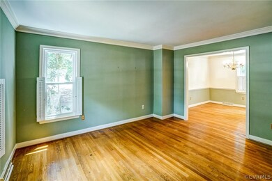 Unfurnished room with wood-type flooring, a notabl