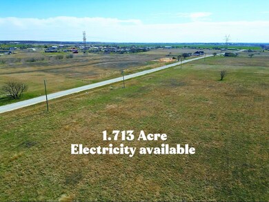Birds eye view of property featuring a rural view