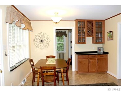 Sunny eat-in area of the kitchen plus more storage
