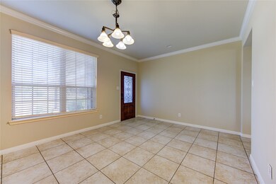 Formal dining w/ crown molding