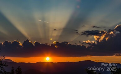 Beautiful Sunsetting Mountain Views from this lot and the two other lots (*across The Falls Rd and beside) - You can purchase all the lots from the seller including the Waterfall Lot and the lots with the Cave- A Big Nature Park of your own!!!