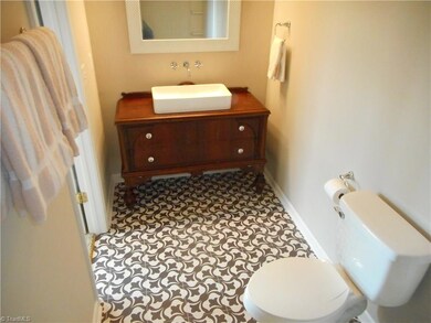Master Bathroom: Room features include decorative vinyl flooring for easy cleaning, the garden tub for a nice relaxing bath after a busy day, and a fabulous decorative vanity, sink and thru the wall fixtures.