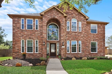 This stately home on a huge cul-de-sac lot offers incredible curb appeal with a traditional brick elevation, an impressive two-story entry, and mature trees.