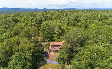 Aerial shot of the home and solar...