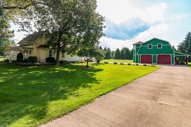 Front view, with view of pole barn/garage