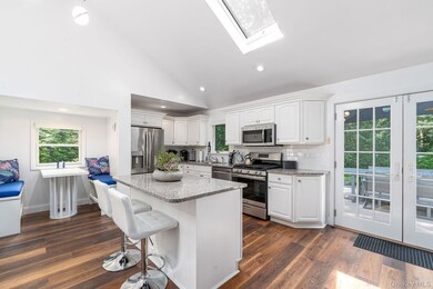 Kitchen with island and a dining nook