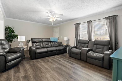 Living room with hardwood / wood-style flooring, c
