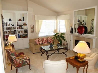Living Room with Vaulted Ceiling & Firep
