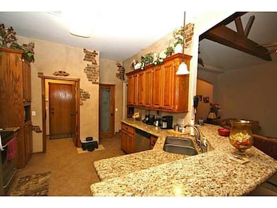Kitchen. tiered granite countertops and pantry wit
