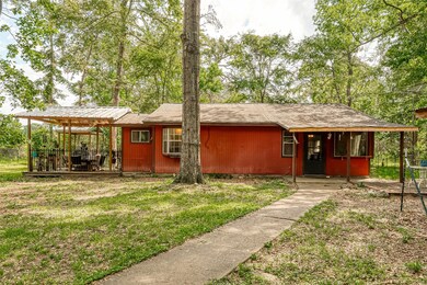 Nice covered patio with wrought iron fencing to enjoy your family gatherings, morning coffee or evening sunset.