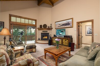 Main living with vaulted open beamed ceilings + co