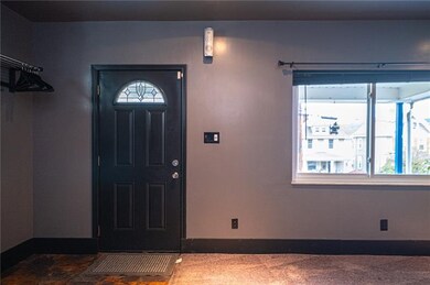 The welcoming entry way to the home is sure to ple