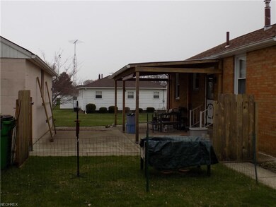 Covered back patio with plenty of room for enterta