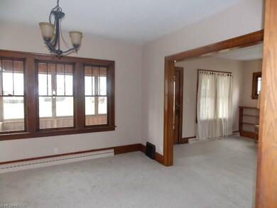 13'x12' dining room looks onto front porch.
