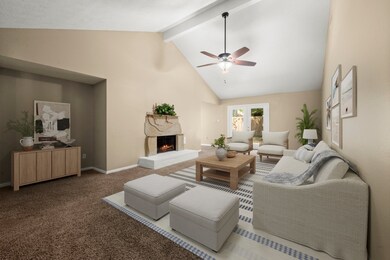 Large and open living room with media nook