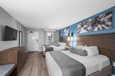 Bedroom featuring wood-type flooring