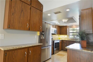 There's plenty of cabinetry for all your storage n
